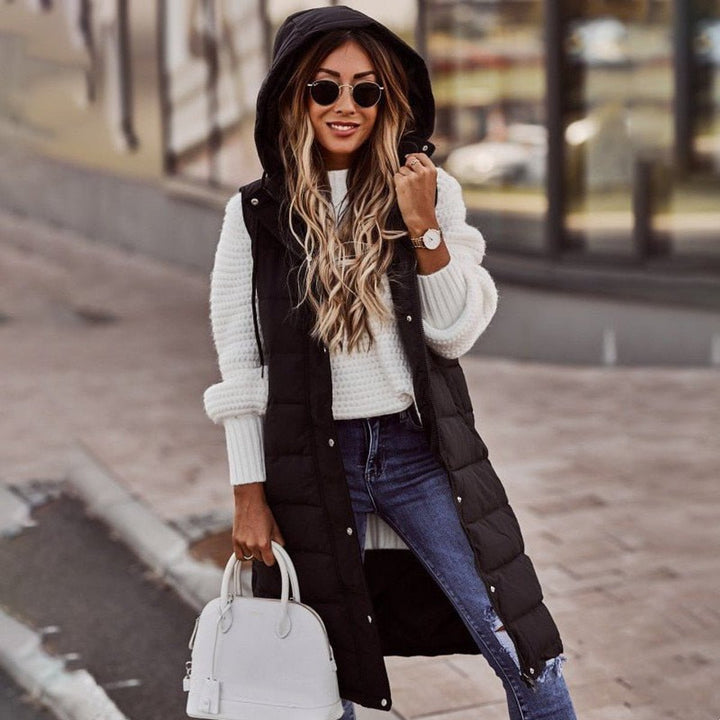 Long Black Puffer Vest for Women - Stylish Sleeveless Knee-Length Quilted Winter Coat with Hood and Pockets 1