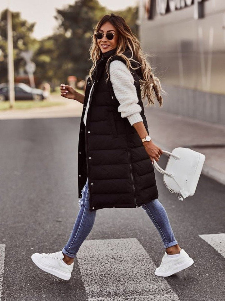 Long Black Puffer Vest for Women - Stylish Sleeveless Knee-Length Quilted Winter Coat with Hood and Pockets 3
