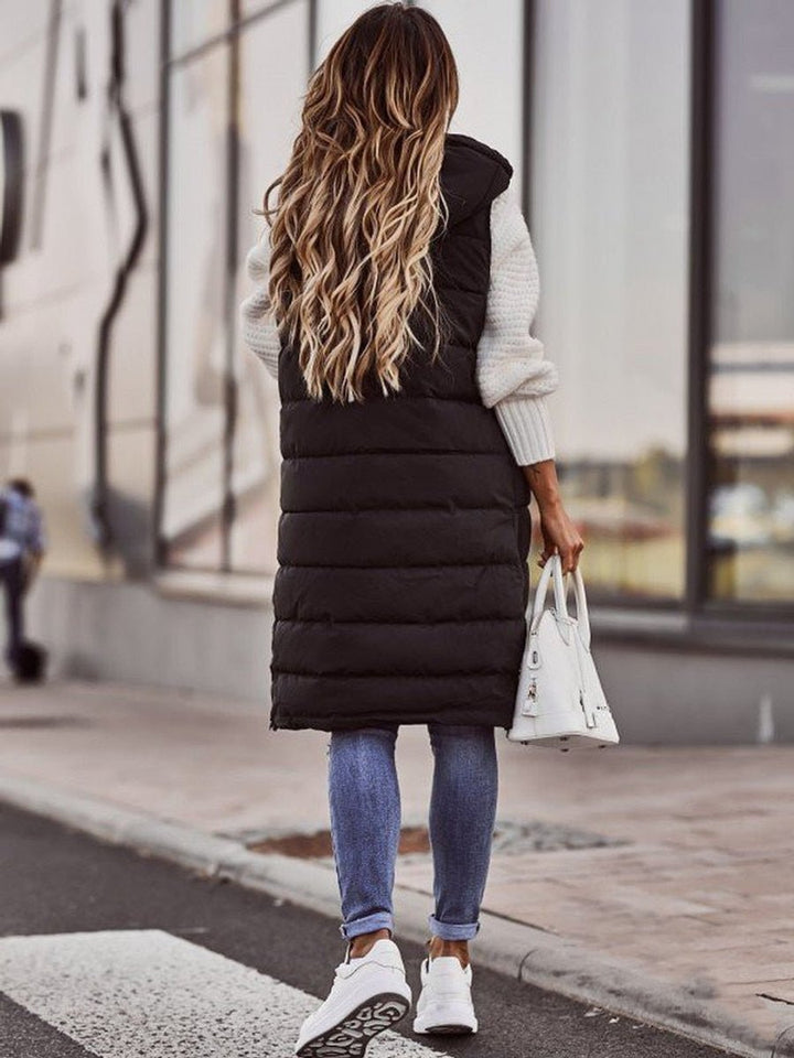Long Black Puffer Vest for Women - Stylish Sleeveless Knee-Length Quilted Winter Coat with Hood and Pockets 4